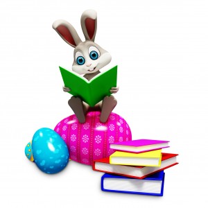 bunny sitting on pile of books